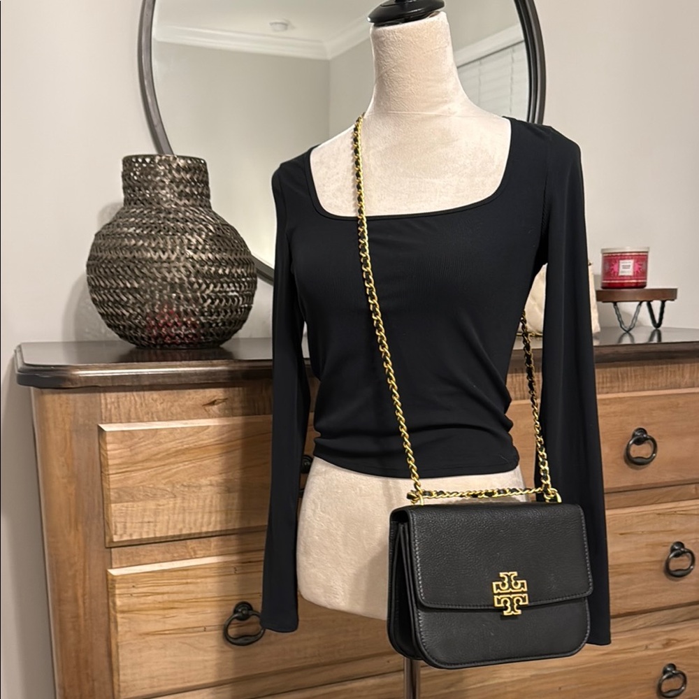 Tory Burch black “Britten”  crossbody bag.